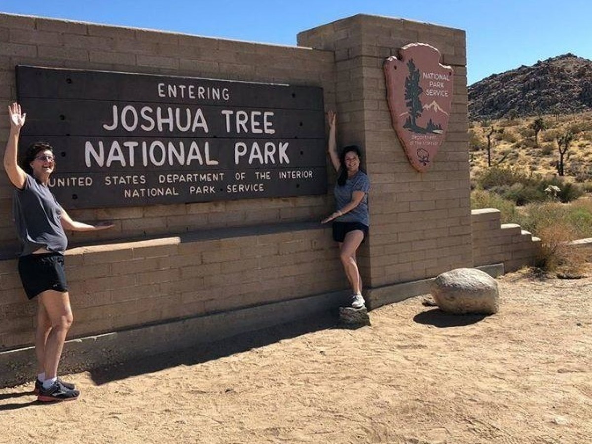 a man holding a sign
