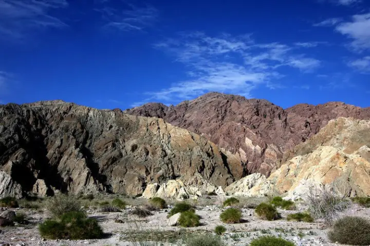 a canyon with a mountain in the background