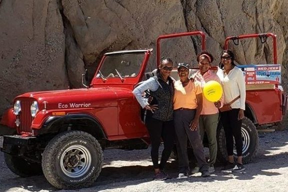a man standing in front of a truck